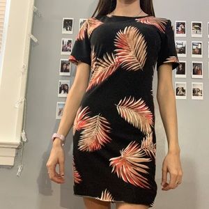 Black dress with orange leaves